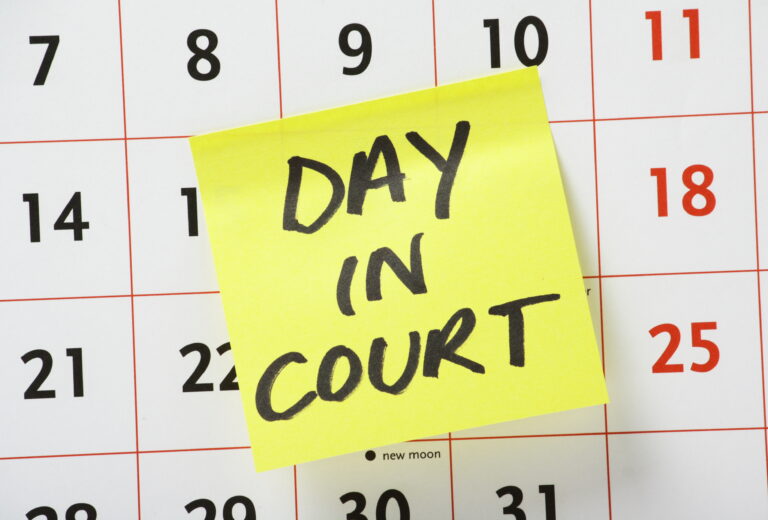 sticky note with day in court writing